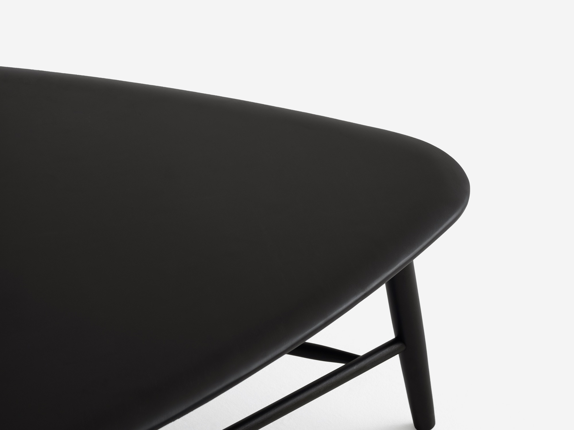 Detail view of black tri coffee table